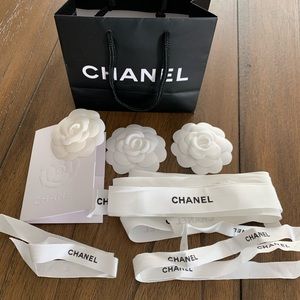 Chanel bag, ribbons, Camelia flowers